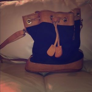 Dooney & Bourke Black canvas & beige leather bag.